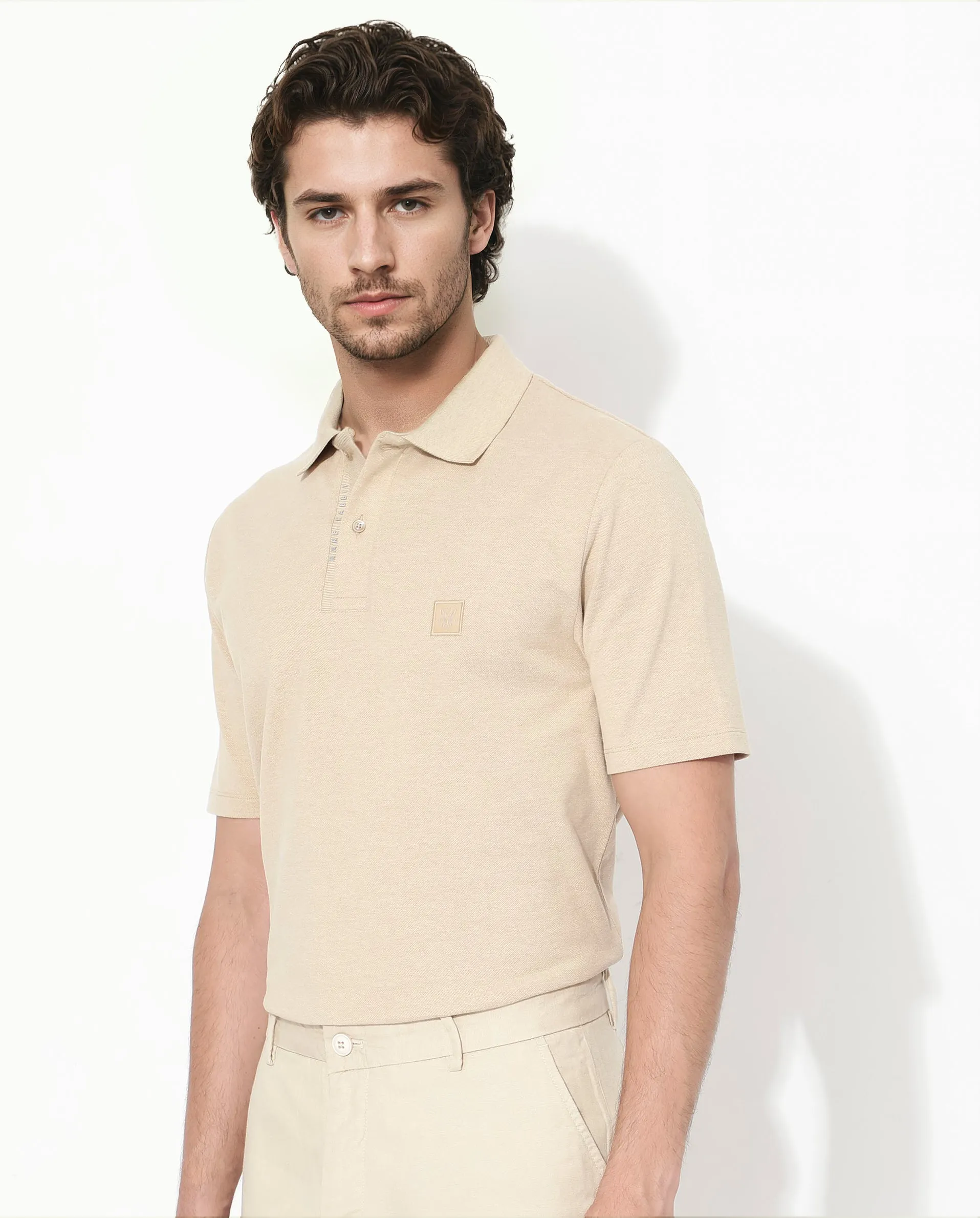 Rare Rabbit Men's Gamor Beige Cotton Poly Fabric Short Sleeves Collared Neck Solid Color Knit Polo T-Shirt