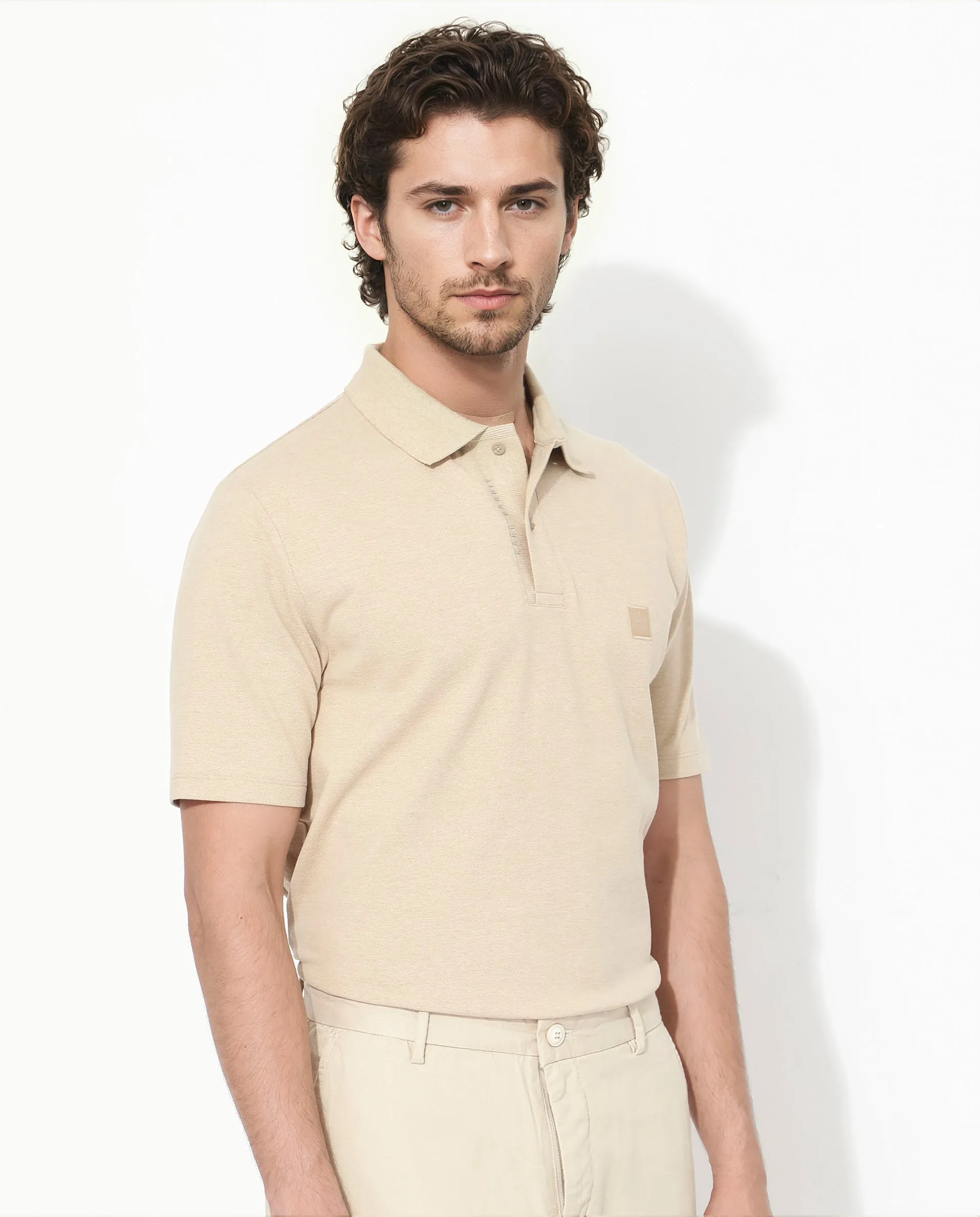 Rare Rabbit Men's Gamor Beige Cotton Poly Fabric Short Sleeves Collared Neck Solid Color Knit Polo T-Shirt