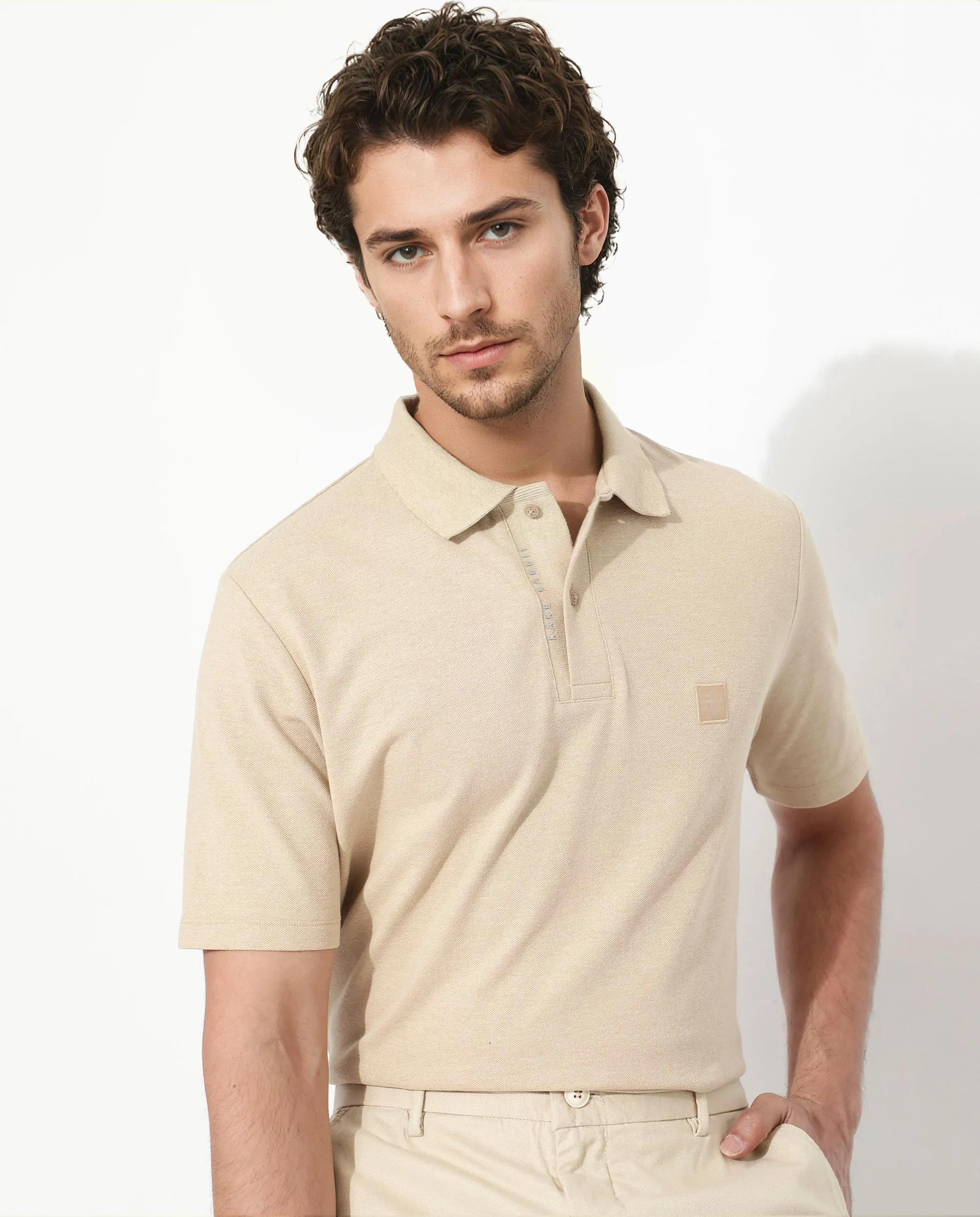 Rare Rabbit Men's Gamor Beige Cotton Poly Fabric Short Sleeves Collared Neck Solid Color Knit Polo T-Shirt